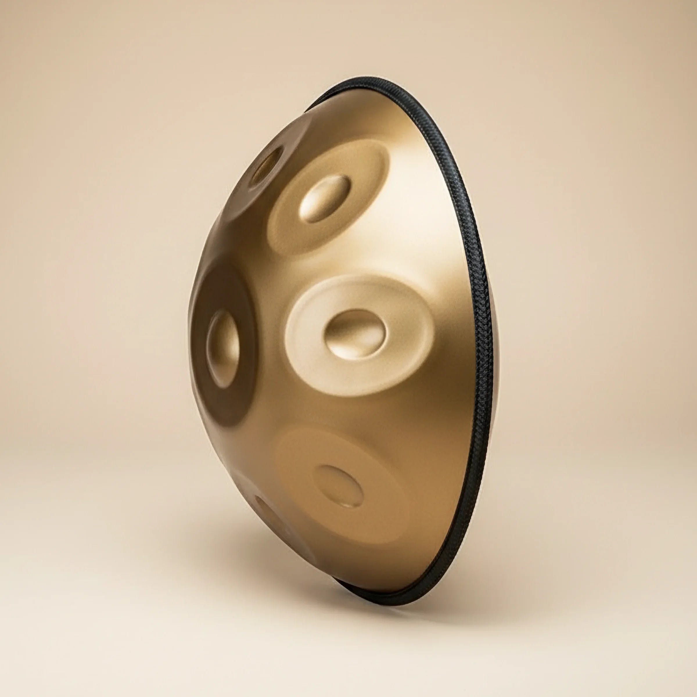 Handpan drum on a beige background