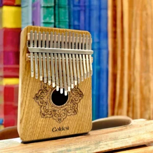 Goldesi natural wood kalimba angled view detail image showing key and wood craftsmanship