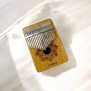 Goldesi natural wood kalimba front view detail image showing key and wood craftsmanship
